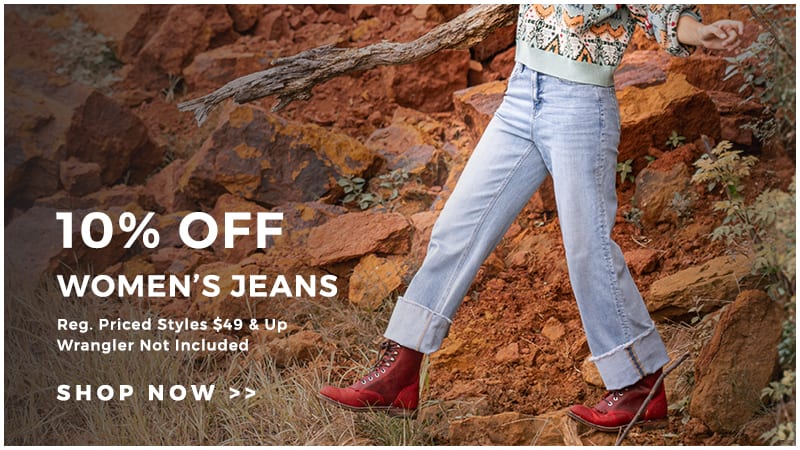 This banner shows a woman wearing light blue jeans with dark red lace up boots to promote Cavender's Fall Round Up Sale promotion of 10% Off Women's Jeans. Text reads "10% OFF WOMEN'S JEANS." Click to shop.